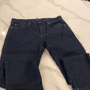 Banana Republic Traveler Denim, dark wash “dark rinse”.